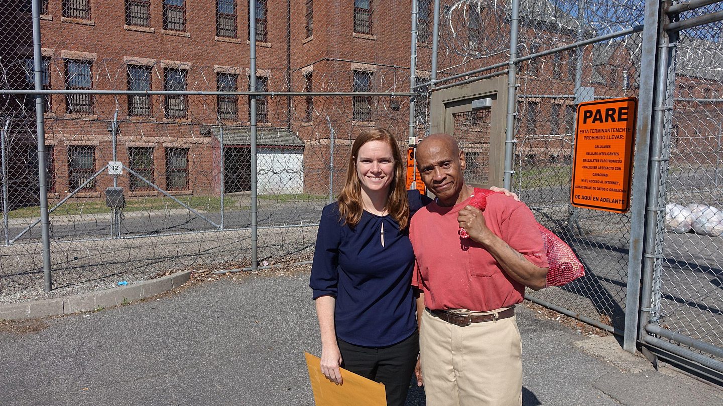 Laura and William at the gate of Fishkill Correctional Facility