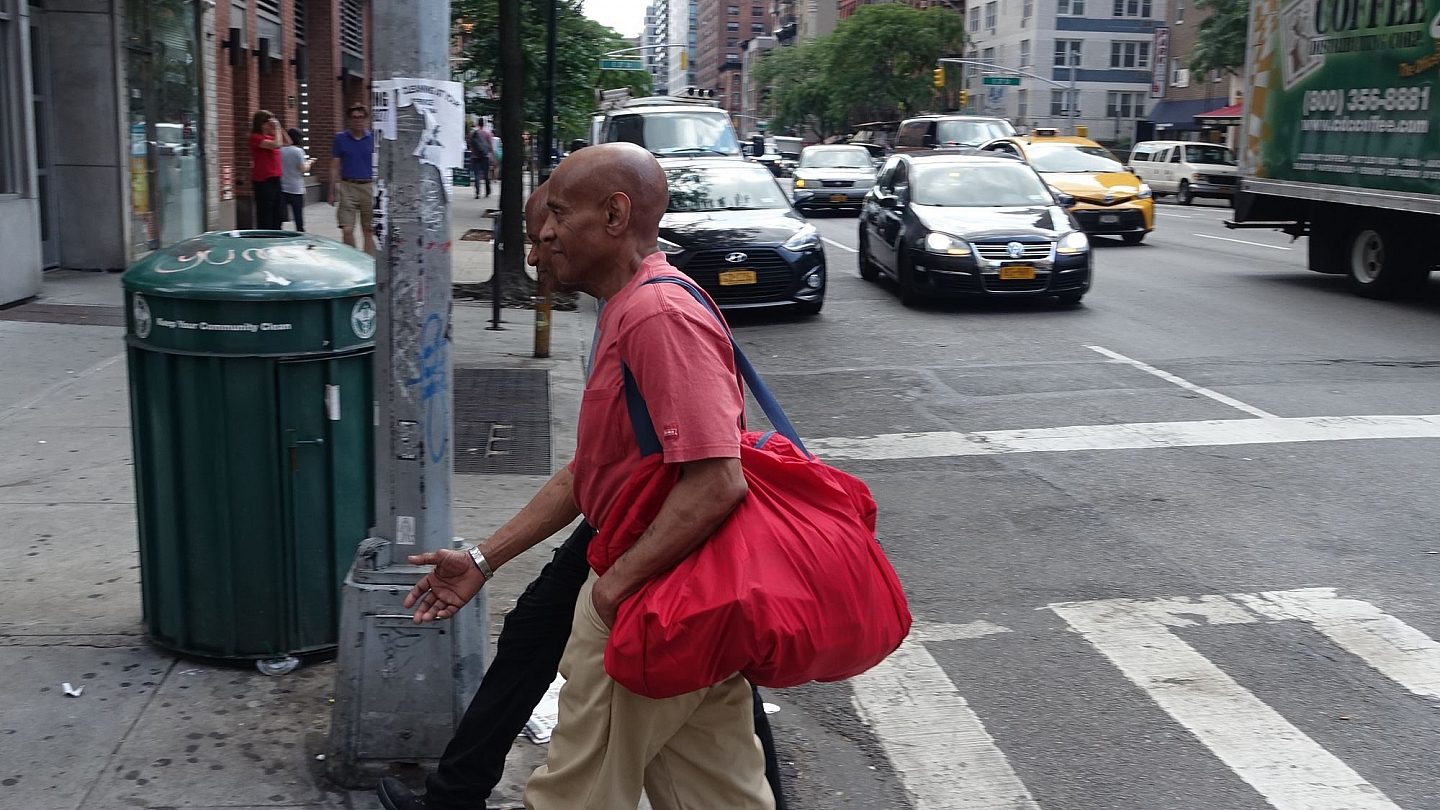 William and his friend crossing the street in Manhattan, a few blocks from Bellevue.