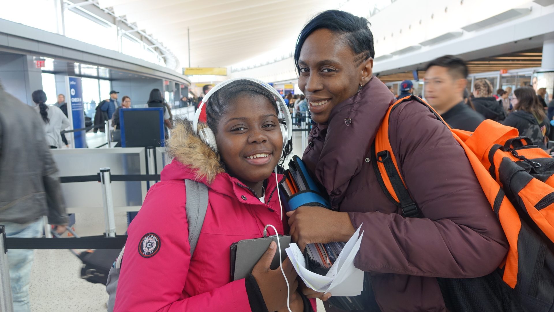 24 A Volunteer Lead Albion trip Diana and youth participant at airport