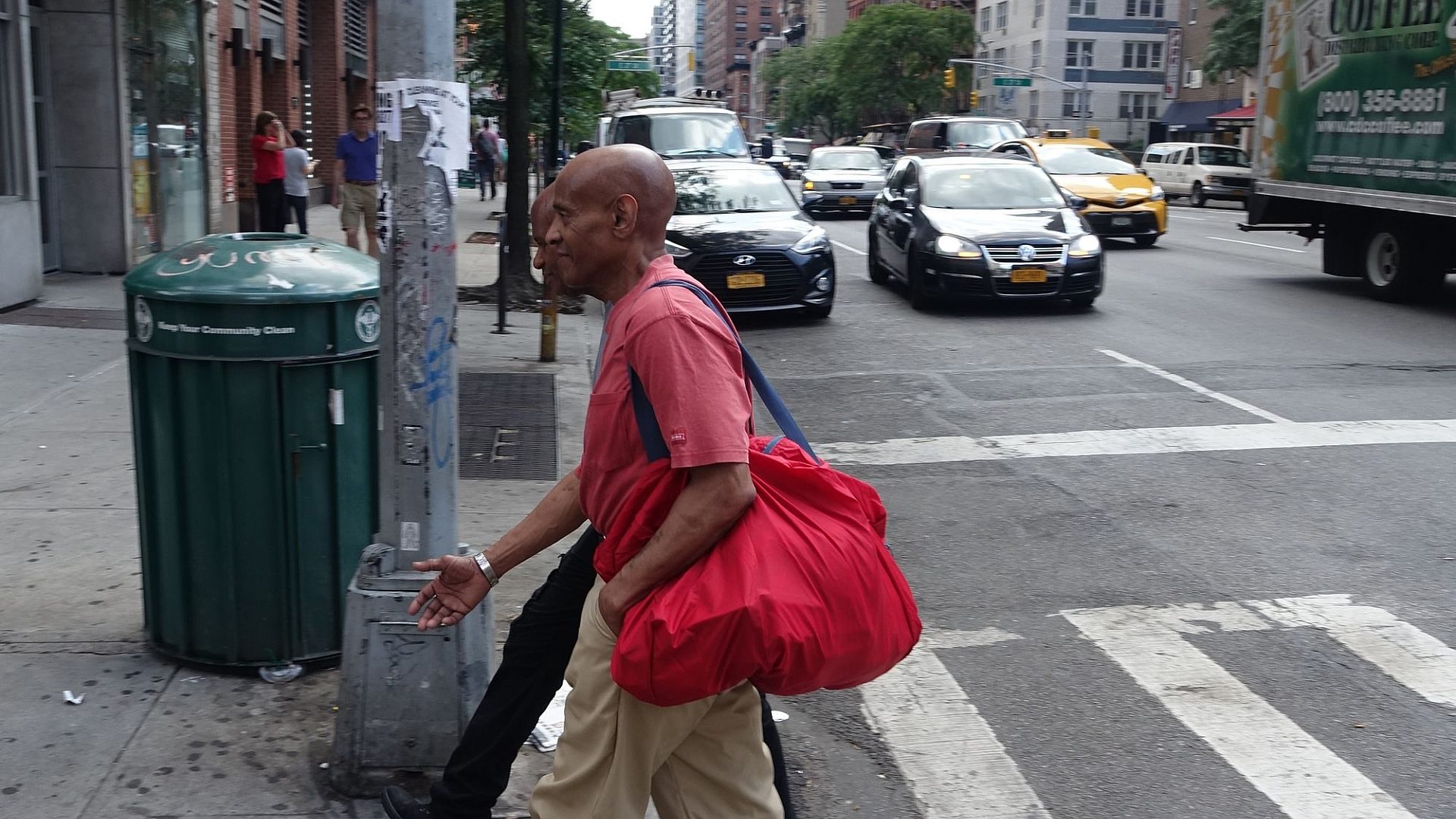 William and his friend crossing the street in Manhattan, a few blocks from Bellevue.