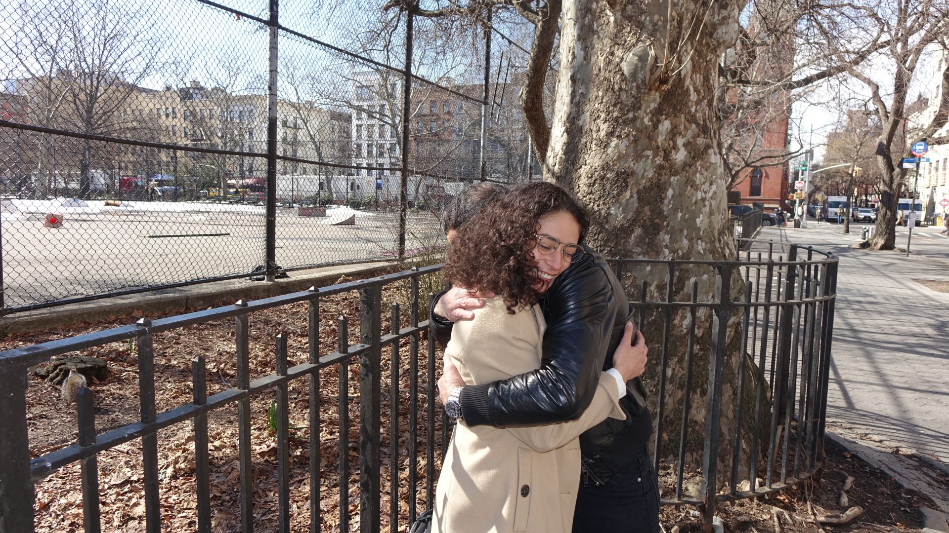 Amanda and Ken Lugo sharing a hug.